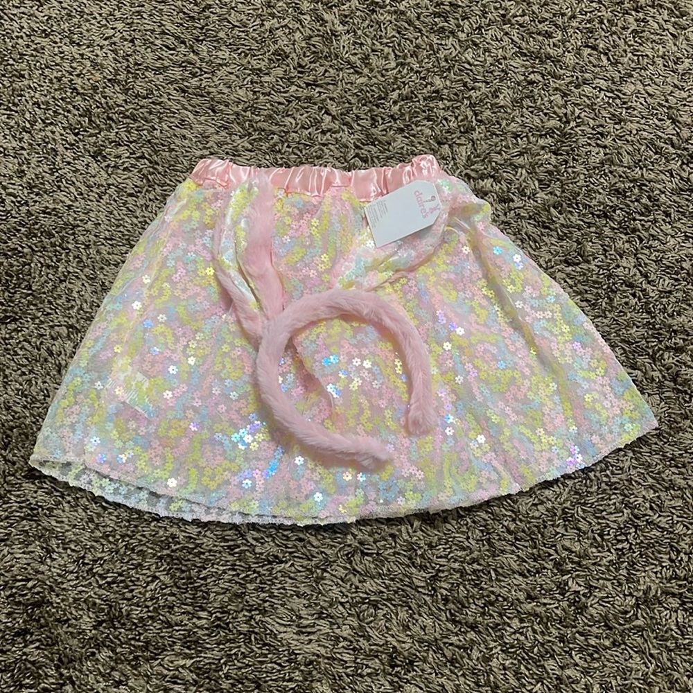 (38) Claire’s Easter Headband and skirt.